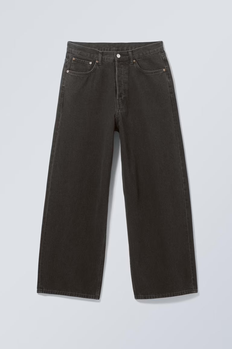 Black jeans on a light gray background